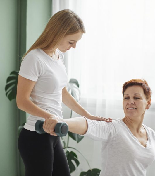 elder-woman-covid-recovery-doing-physical-exercises-with-dumbbell